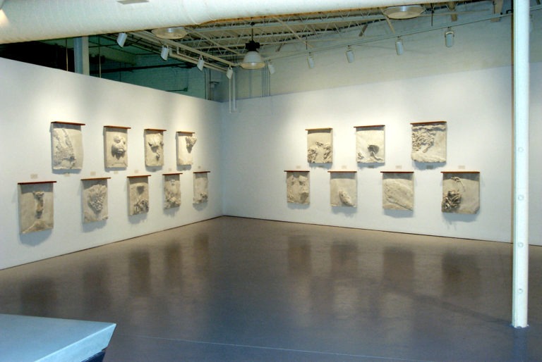 Ed-Smith-2nd-GRAND-BATTLE-installation-view-Ed-Smith-50-relief-sculptures-768x514